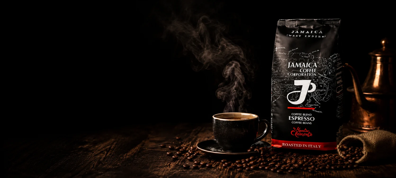 Jamaica Coffee espresso beans with a steaming cup on a dark table